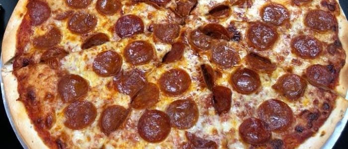 Cochiaro’s Pizza: deliciosa pizza artesanal con masa fina y quesos premium – foto alta resolución