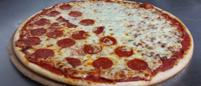 Chely’s Pizza: Deliciosa pizza artesanal con queso fundido y toppings frescos